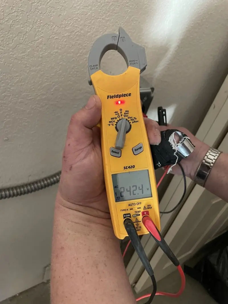 Voltage testing with clamp meter during Aluminum Wiring Replacement in Washington